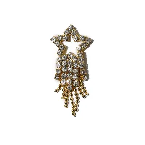Star shaped nail art charm with crystal rhinestones and gold tassel chains