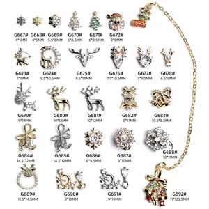 Christmas nail art charms collection with snowflakes, reindeer, and rhinestone details