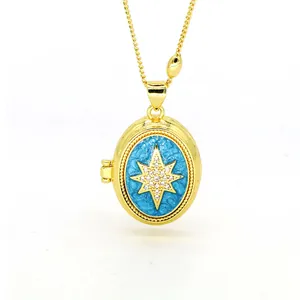 Close-up of a blue enamel oval locket pendant necklace with an eight-pointed star