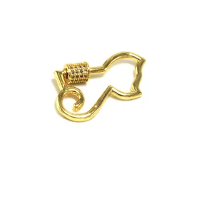 Close-up of gold-plated cat-shaped jewelry clasp with micro-set zircon details