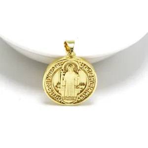 Detailed view of a gold St. Benedict religious medal pendant for jewelry making