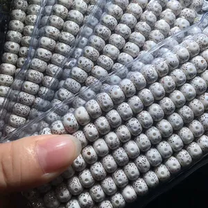 Macro detail of high-density white Xingyue Bodhi seeds with natural star patterns
