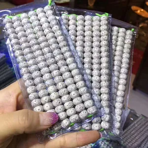 Close-up view of 108 Xingyue Bodhi beads packs featuring natural star and moon patterns