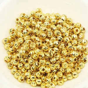 Close-up of textured 18k gold plated spacer beads for handmade DIY jewelry making projects