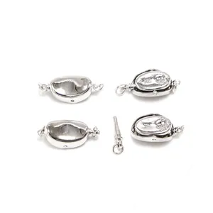 Close-up detail of silver-plated ingot-shaped plug-in clasps for DIY necklace making.