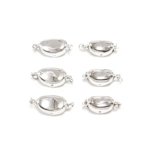 Detail of six silver-plated jewelry clasps with high-polish mirror finish for DIY crafts