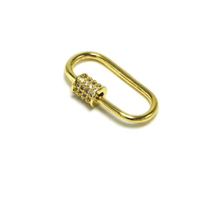 Close-up view of a gold-plated oval jewelry screw clasp connector with pavé zircon stones