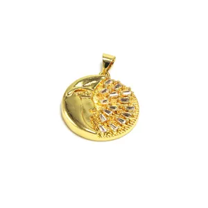 Detailed view of a celestial gold moon face pendant with baguette-cut crystals