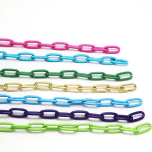 Close-up of colorful DIY jewelry chains in various finishes for punk hip-hop style accessories.