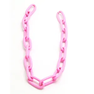Close-up of vibrant pink acrylic chunky chain links for DIY punk hip hop jewelry