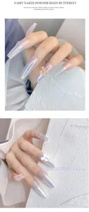 Close-up view of cute 3D resin bow charms on long iridescent manicured nails for DIY nail art