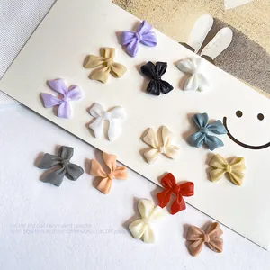 3D resin bow nail art decorations in assorted colors for cute DIY manicure design