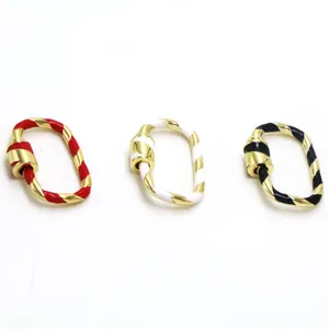 Vue détaillée de trois fermoirs à vis en émail pour bijoux DIY en rouge, blanc et noir