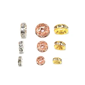 Detaillierte Ansicht von Kristall-Strass-Zwischenperlen in Gold, Roségold und Silber.