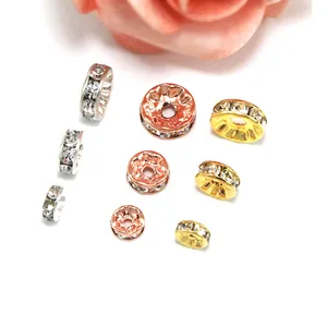 Detailansicht von Strass-Zwischenperlen in Gold, Silber und Roségold für DIY-Schmuck.