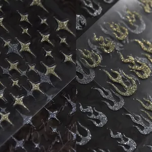 3D glitter star and flame nail art stickers in metallic gold and silver finish