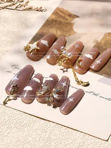 Bijoux d'ongles exquis en zircon et perles avec chaîne étoile, lune et papillon dorée