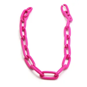 Detailed close-up view of vibrant pink chunky acrylic chain links for DIY jewelry craft