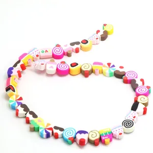 Detailed macro view of colorful polymer clay beads in various food and candy shapes