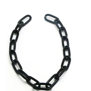 Detail view of black chunky acrylic chain links for DIY punk hip-hop jewelry making