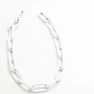 Close-up of white chunky chain link accessory for punk and hip-hop jewelry DIY projects
