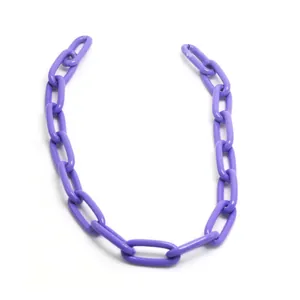 Detail view of a vibrant purple oval link chain for punk and hip hop DIY jewelry crafts