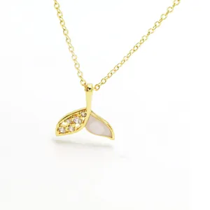 Elegant gold plated fishtail necklace with white shell inlay and zirconia stones