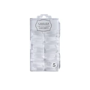 Frosted matte thin nail tips in 10-compartment clear organizer box for extension.