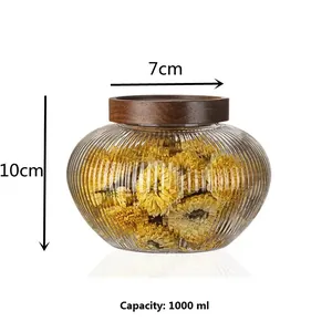 Detail view showing 1000ml capacity and dimensions of the ribbed glass storage jar.