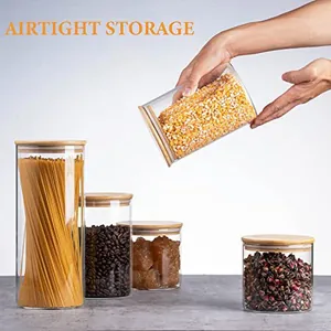 Set of airtight glass storage jars with bamboo lids for kitchen food organization