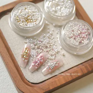 Professional Christmas nail art rhinestone kit featuring zircon beads and festive tree designs