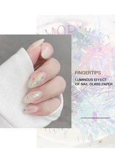 Iridescent aurora nail glass paper fragments showing luminous effect on manicured nails