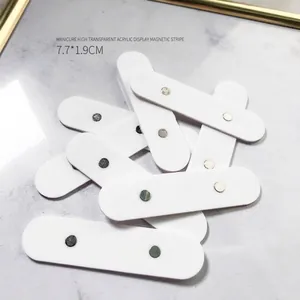 High-quality detail view of white acrylic magnetic strips for nail art display 7.7x1.9cm