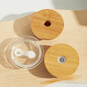 Close-up detail of eco-friendly bamboo and transparent plastic lids for 16oz can glasses