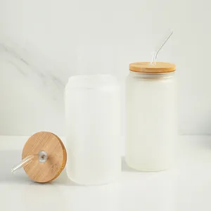 Close-up detail of 16oz frosted glass can cup with eco-friendly bamboo lid and glass straw.