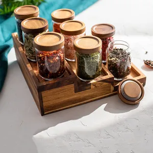 Juego de tarros de cristal para especias con tapas de acacia y estante de madera