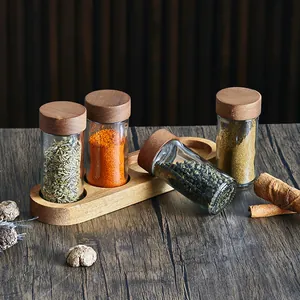 Set of 4 Japanese style 3oz glass spice jars with acacia wood lids and wooden base stand