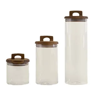 Set of three borosilicate glass storage jars with airtight acacia wood handle lids