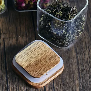 Square glass tea canister with airtight acacia wood lid for storage of dry tea leaves