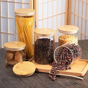 5-piece set of transparent glass storage jars with bamboo lids for kitchen organizing