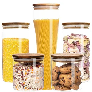 Set of 5 clear glass storage jars with airtight bamboo lids for kitchen organization