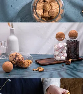 Close-up of clear glass storage jars with spherical cork lids for food organization.