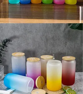 Detail view of colorful frosted gradient sublimation glasses with bamboo lids and glass straws.