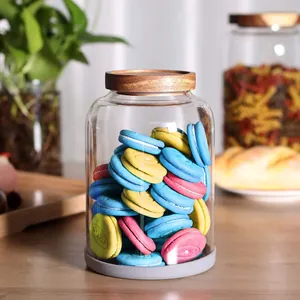 Large borosilicate glass food storage jar with airtight natural acacia wood lid.
