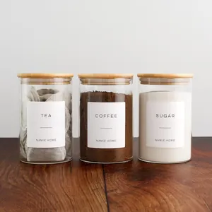 Lot de trois bocaux en verre avec couvercles en bambou pour le thé et le sucre