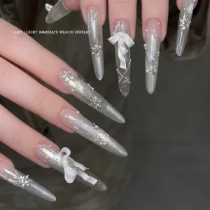 Silver snowflake zircon press-on nails with Christmas pearls and glitter details