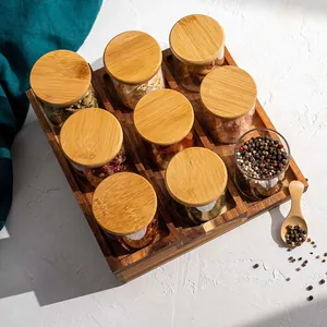 Set di barattoli per spezie in vetro con coperchi in bambù e vassoio in legno
