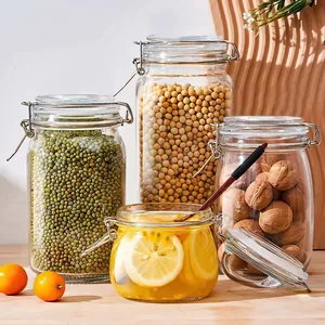 Detailed view of glass storage jars with airtight wire-top lids for kitchen food storage