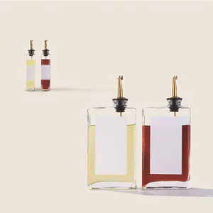 Modern 350ml leak-proof glass olive oil and vinegar dispenser set with elegant gold spouts