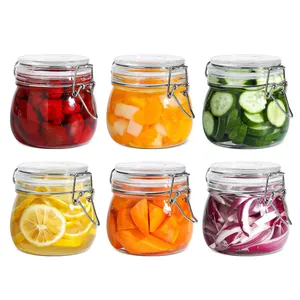 Close-up of six airtight glass jars containing vibrant pickled fruits and vegetables